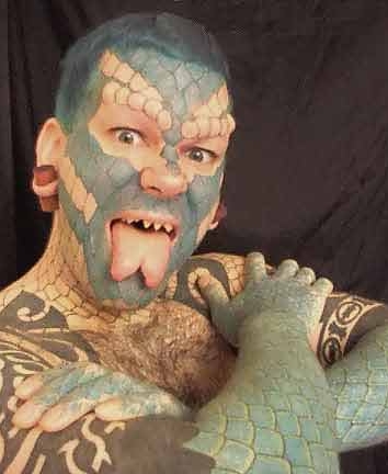 dragon tattoo man. lizard man tattoo